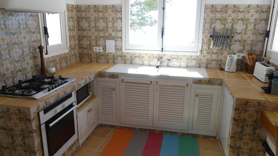 The classically Ibizan kitchen in Villa Trillo with plenty of modern amenities