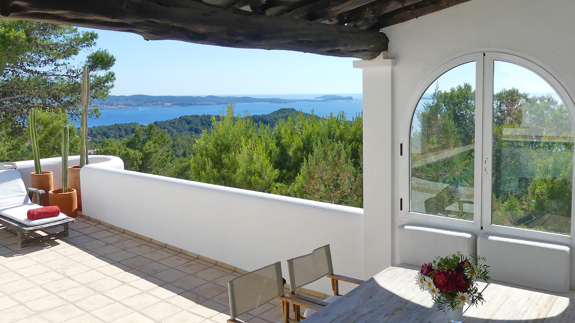 Large balcony to enjoy at luxury rental Villa Trillo in Ibiza with beautiful views.