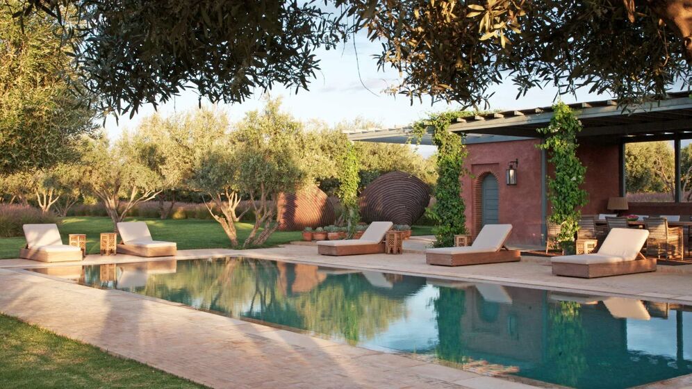 Swimming pool and lounge area at Villa Angela Marrakech