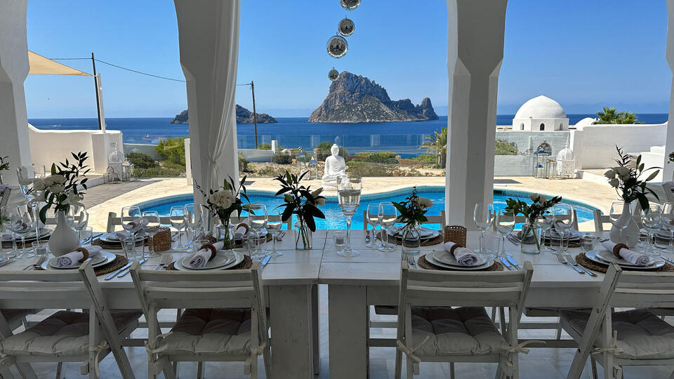 Fully laid out dining table at the exterior Villa Arabian in Ibiza