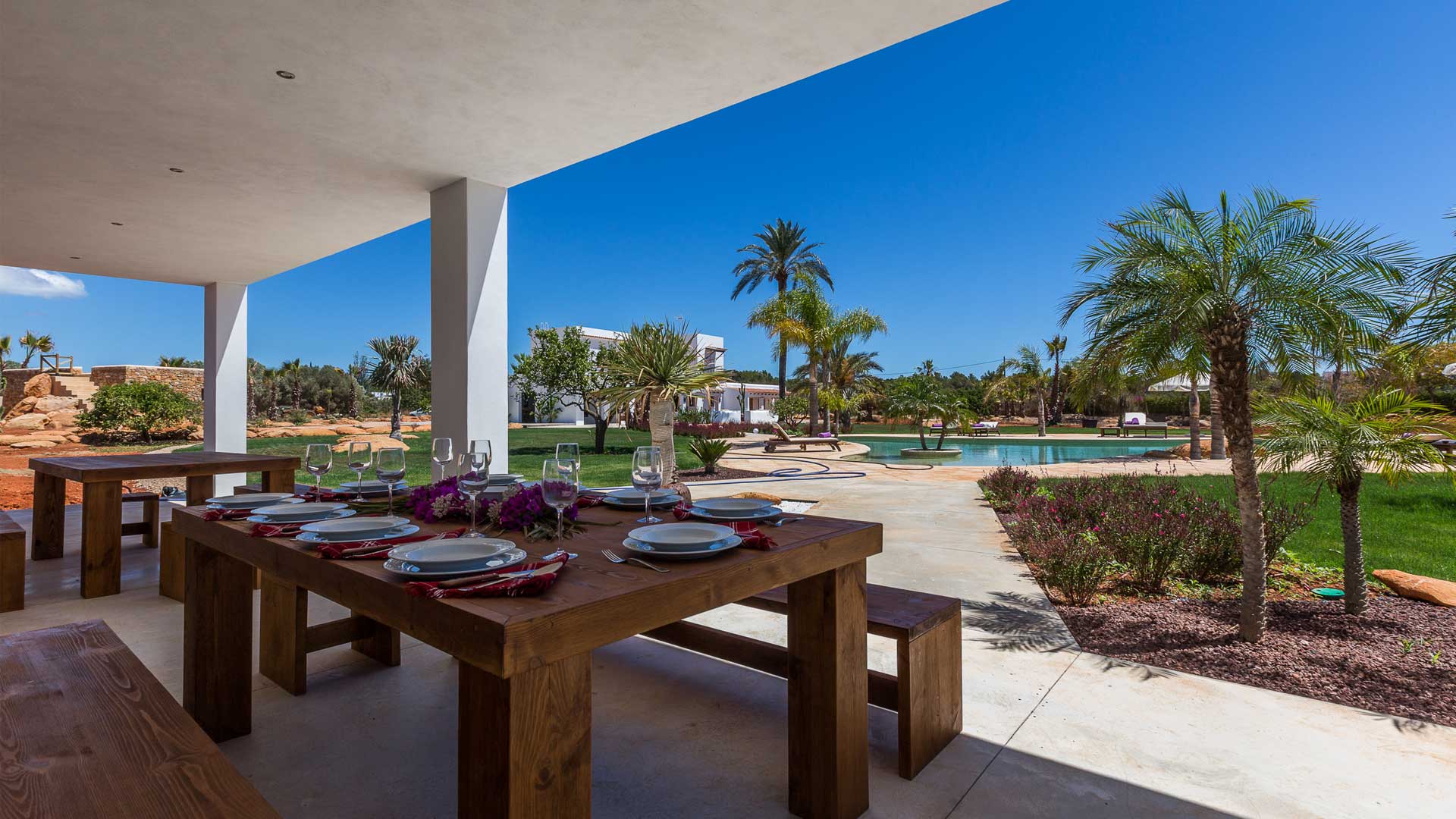Shaded exterior dining area ideal for alfresco dining at Villa Es Canar in Ibiza