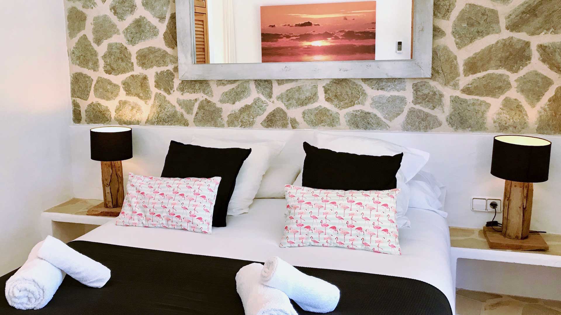 One of the bedrooms in Villa Garroba in Ibiza a luxury rental villa