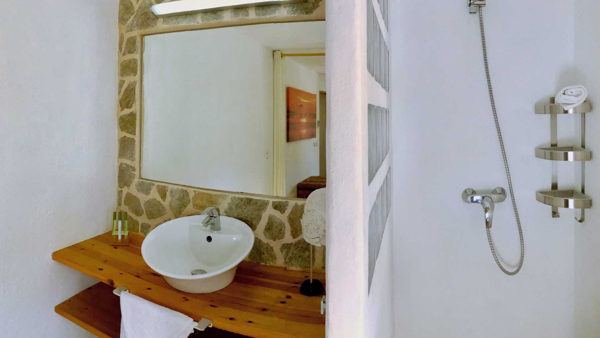 One of the bathrooms with walk in shower at Villa Garroba in Ibiza