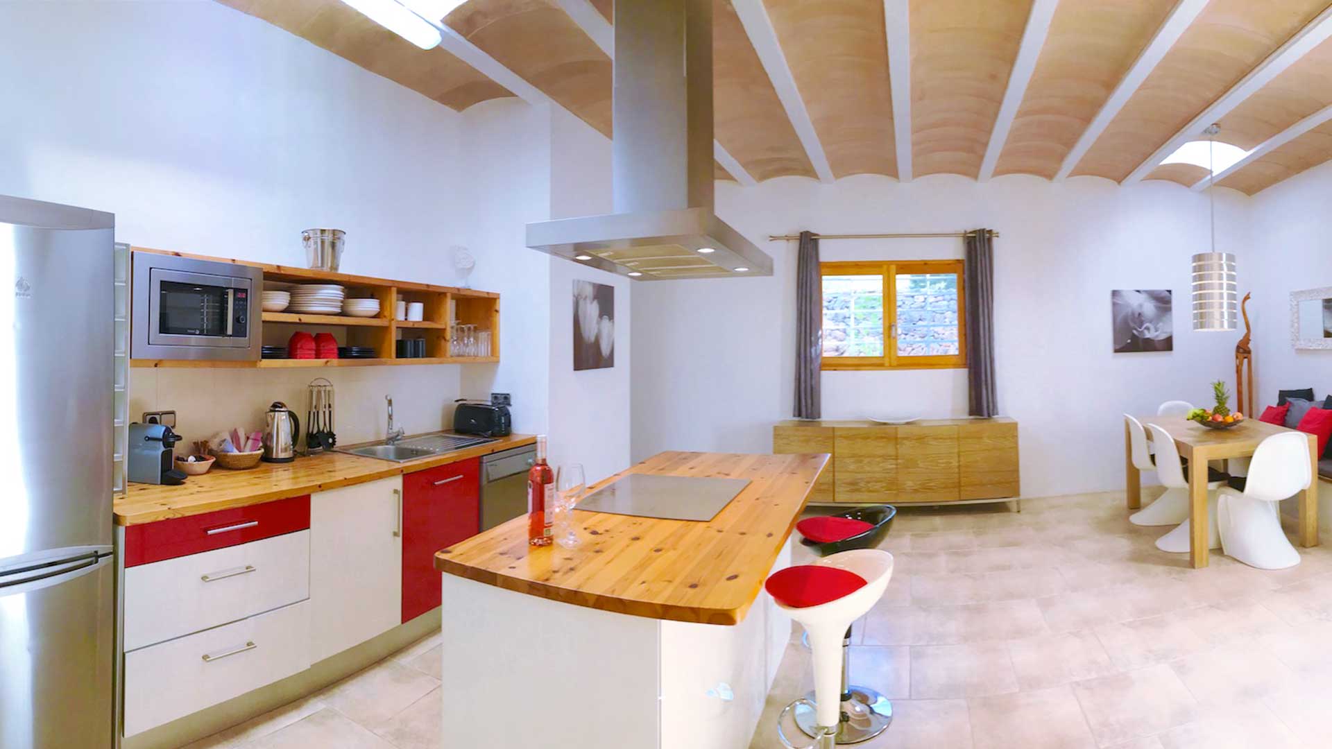 Breakfast counter in the kitchen at Villa Garroba in Ibiza with light woods