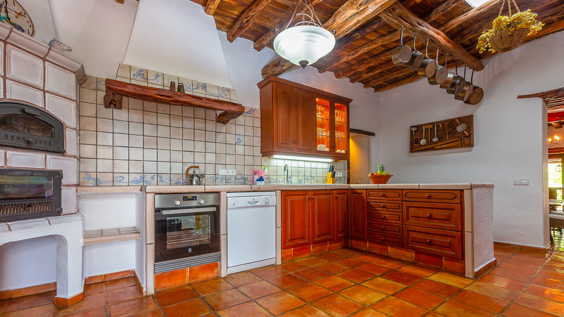 A classic Ibizan style kitchen in Villa Guerxo with modern appliances