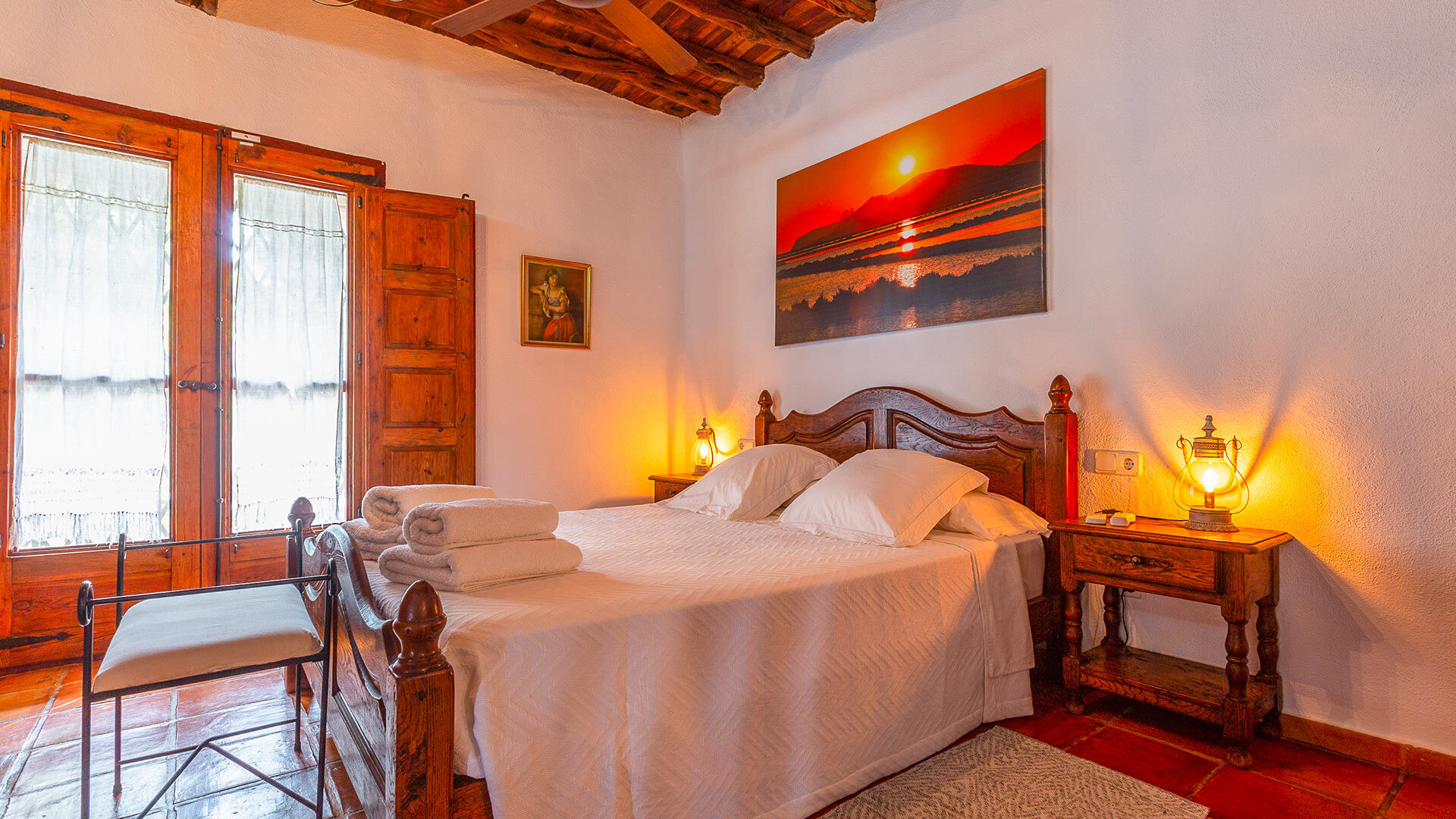The beautifully red large bedroom in Villa Guerxo in Ibiza