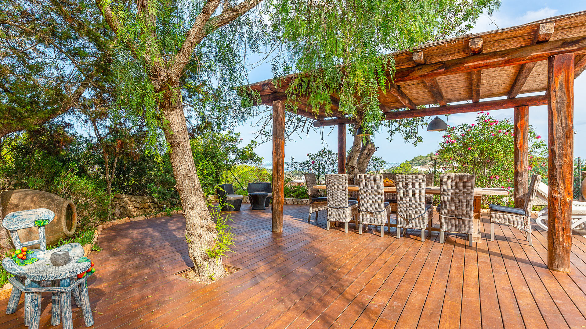 Pergola and outdoor lounging area in Villa Guerxo in Ibiza