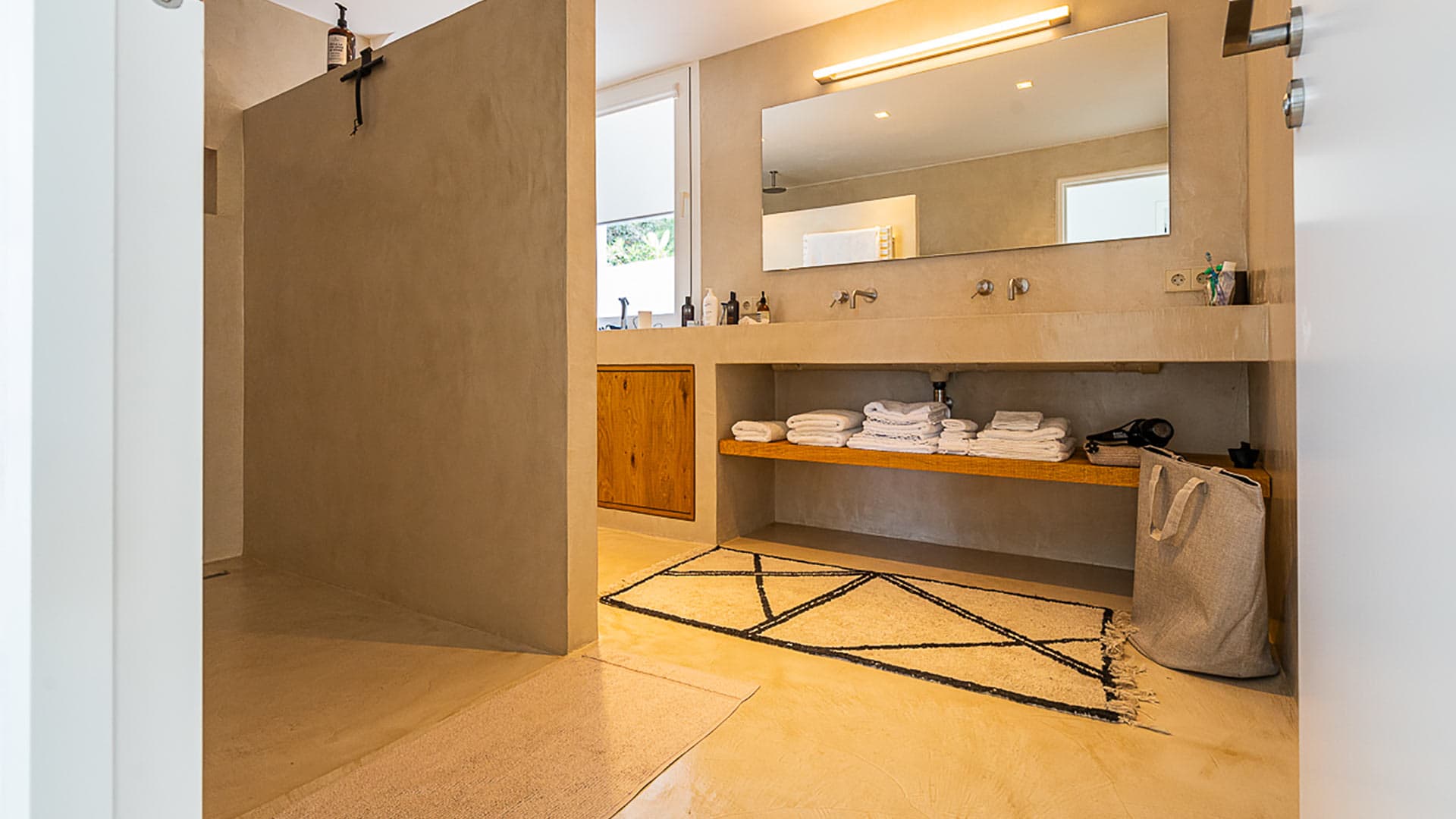 Warm toned bathroom in Villa Orizonia in Ibiza