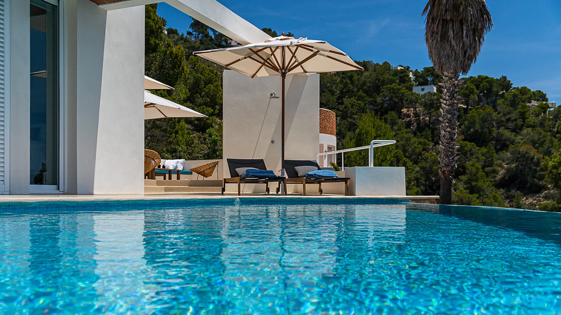 Poolside at Villa Orizonia in Ibiza - rental from Bluemoon