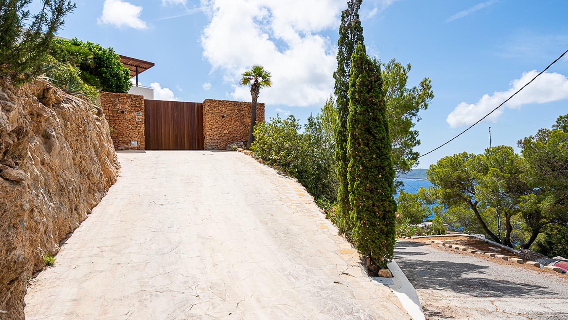 Drive up to the gated Villa Orizonia in Ibiza