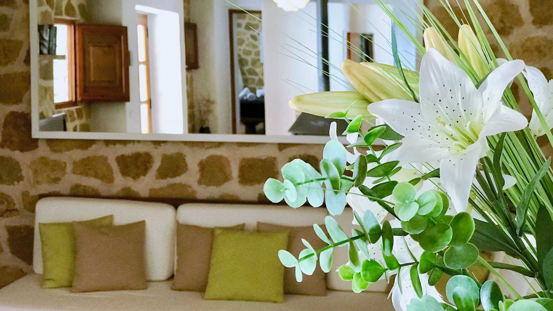Beautiful white flowers in one of the living spaces in Villa Payesa in Ibiza 