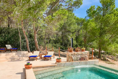 Swimming pool at Villa Payesa with beautiful Ibizan flora