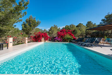 Lengthy pool at Villa Tiramar in Ibiza perfect for morning laps or afternoon hangs