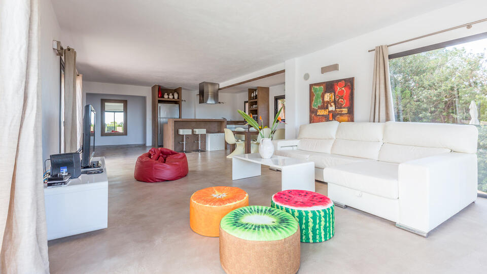 Living area at the luxury Villa Tiramar in Ibiza with kiwi, orange and watermelon cushions
