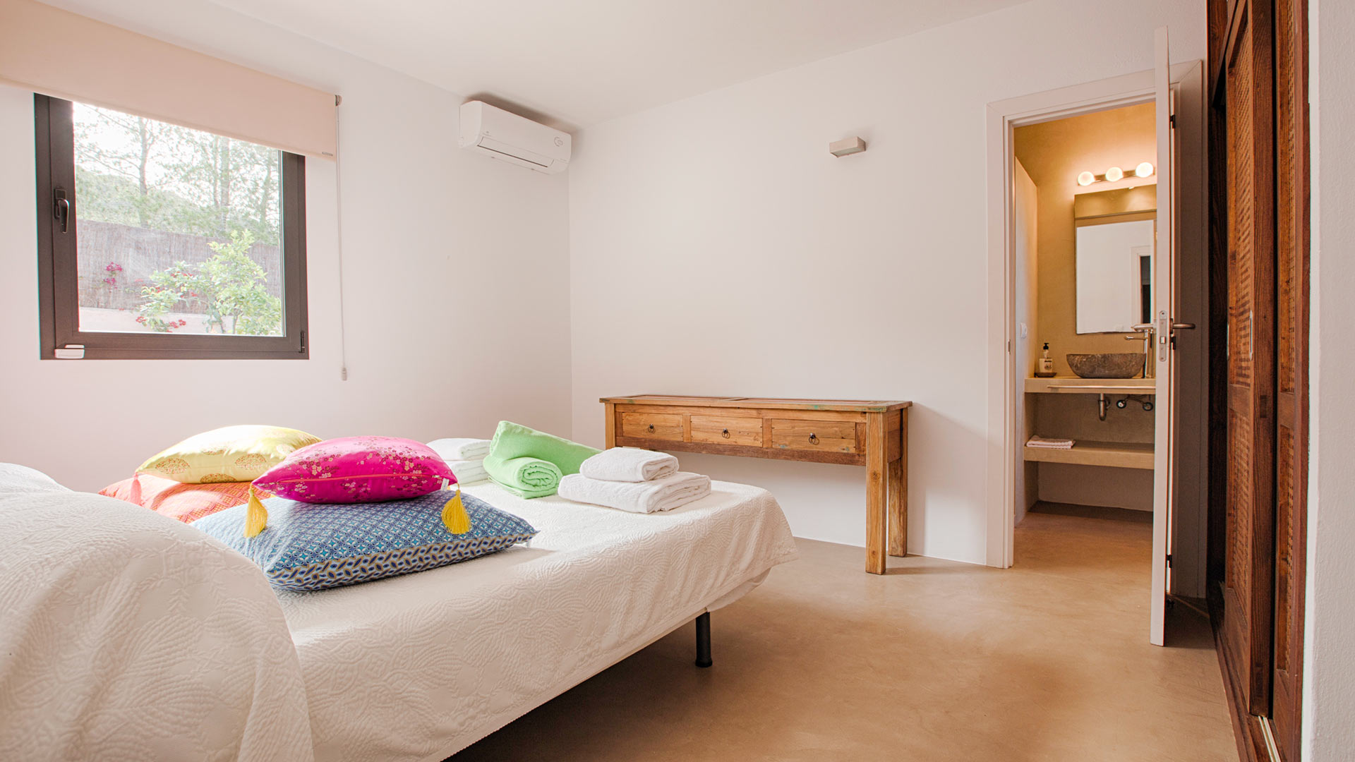 One of the large comforting bedrooms with ensuite at Villa Tiramar in Ibiza