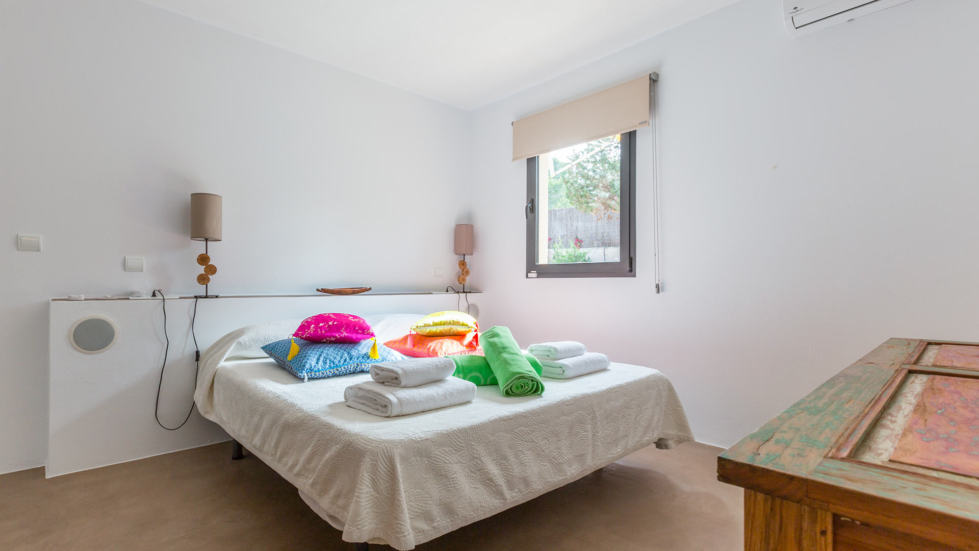 Large bedrooms at Villa Tiramar in Ibiza with a dreamy view