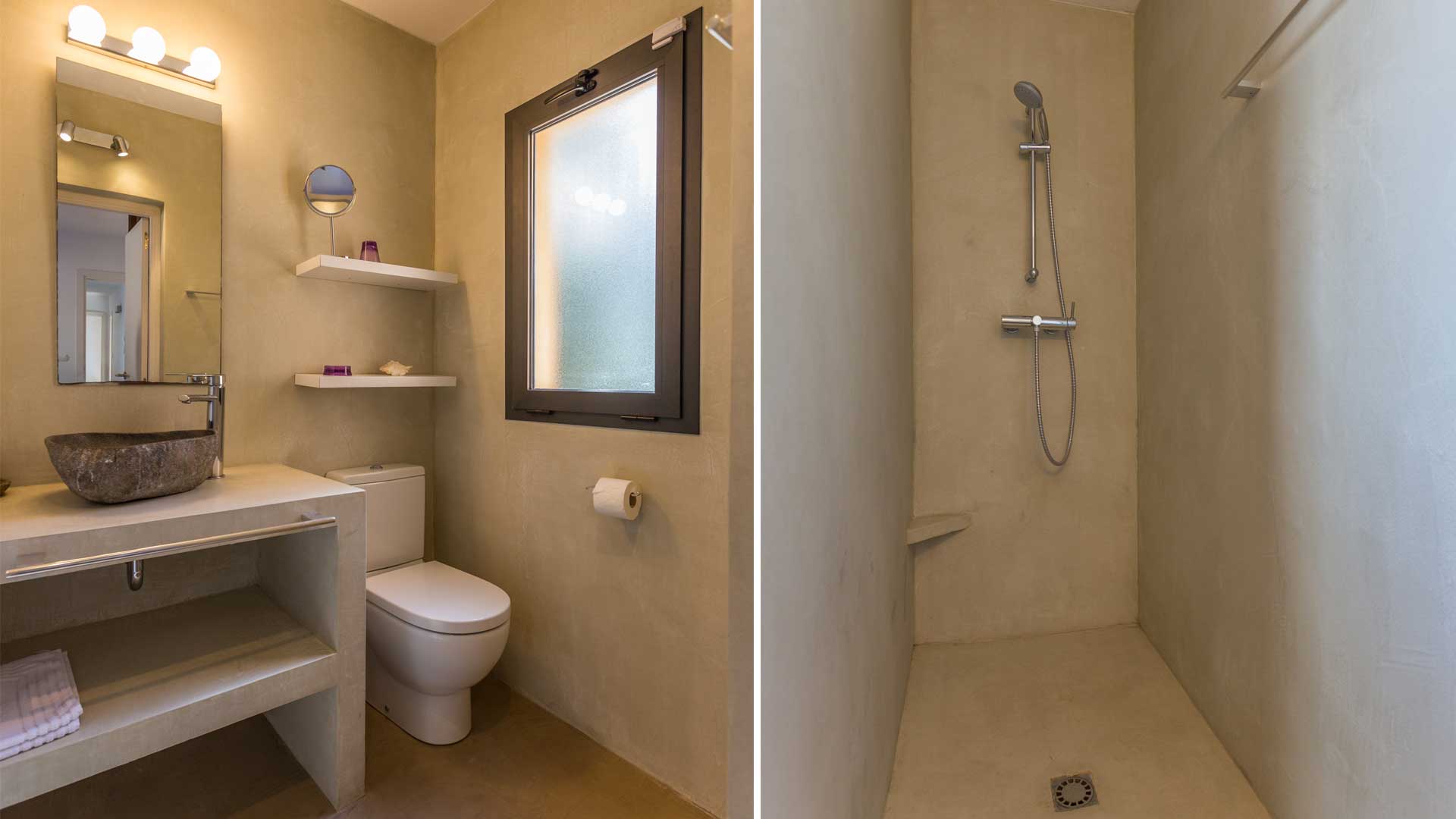 Perfectly modern bathrooms with slate colours at Villa Tiramar in Ibiza