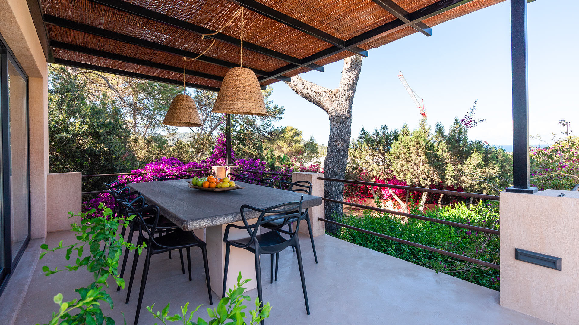 Shaded dining table perfect for alfresco dining at Villa Tiramar in Ibiza