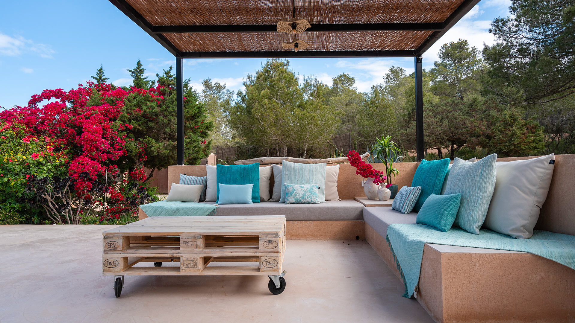 Relaxing area under a pergola at Villa Tiramar in Ibiza