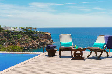 Poolside photos from luxury vacation rental Voramar