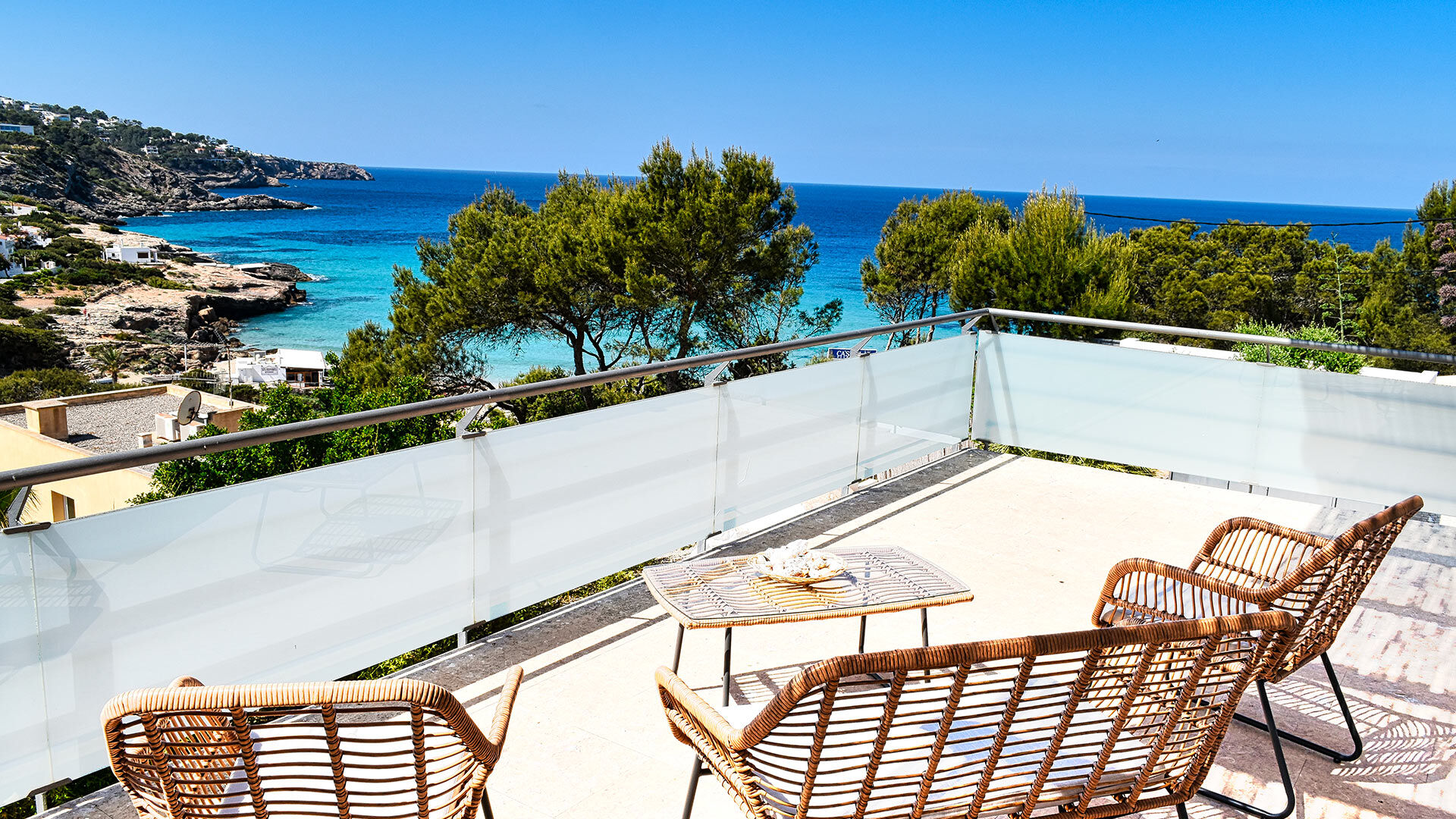 Balcony at Villa White Beach in Ibiza overlooking the endless Mediterranean Sea