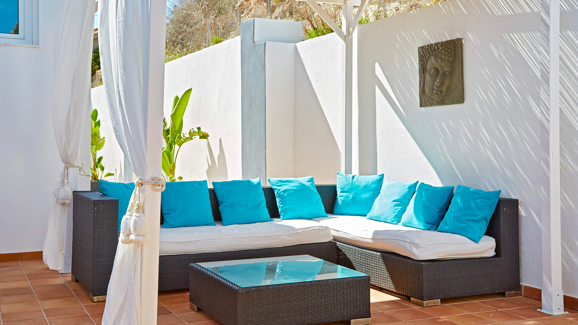 Comfortable and inviting outdoor seating at Villa White Beach in Ibiza