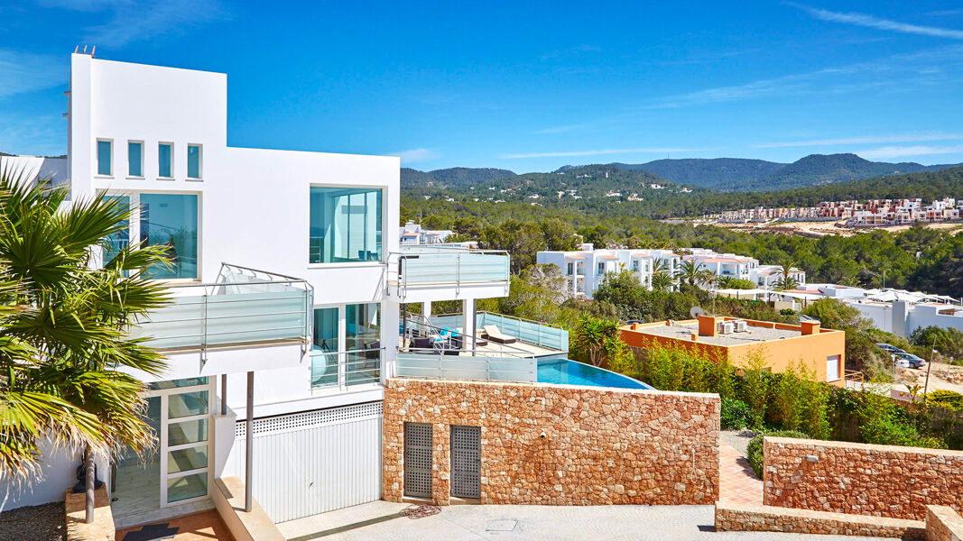 Front view of the grand luxury Villa White Beach in Ibiza, vacation rental from Bluemoon