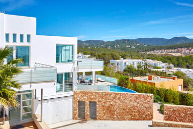 Front view of the grand luxury Villa White Beach in Ibiza, vacation rental from Bluemoon