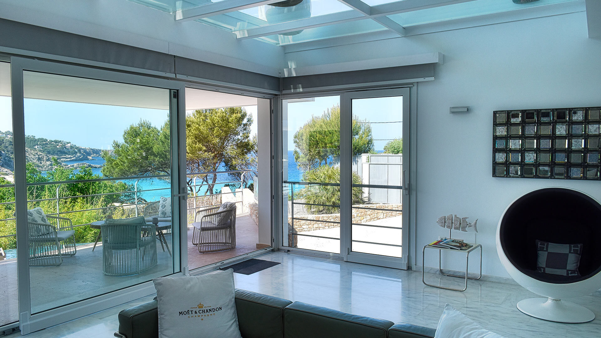 Balcony view from the living space at Villa White Beach in Ibiza, blending the interior and exterior