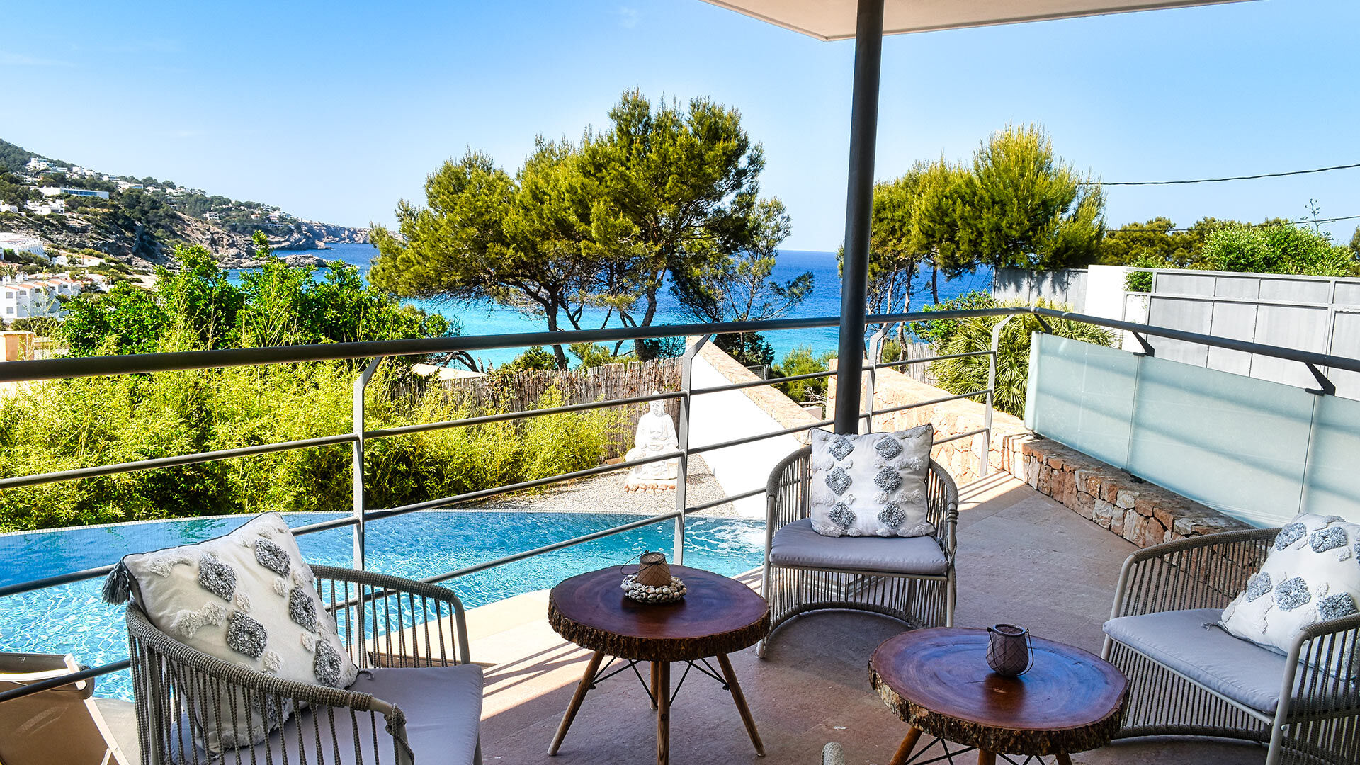 Beautiful patio overlooking the pool at Villa White Beach in Ibiza