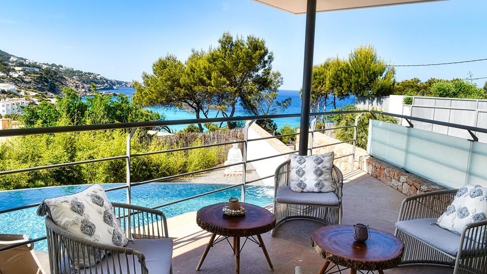 Beautiful patio overlooking the pool at Villa White Beach in Ibiza