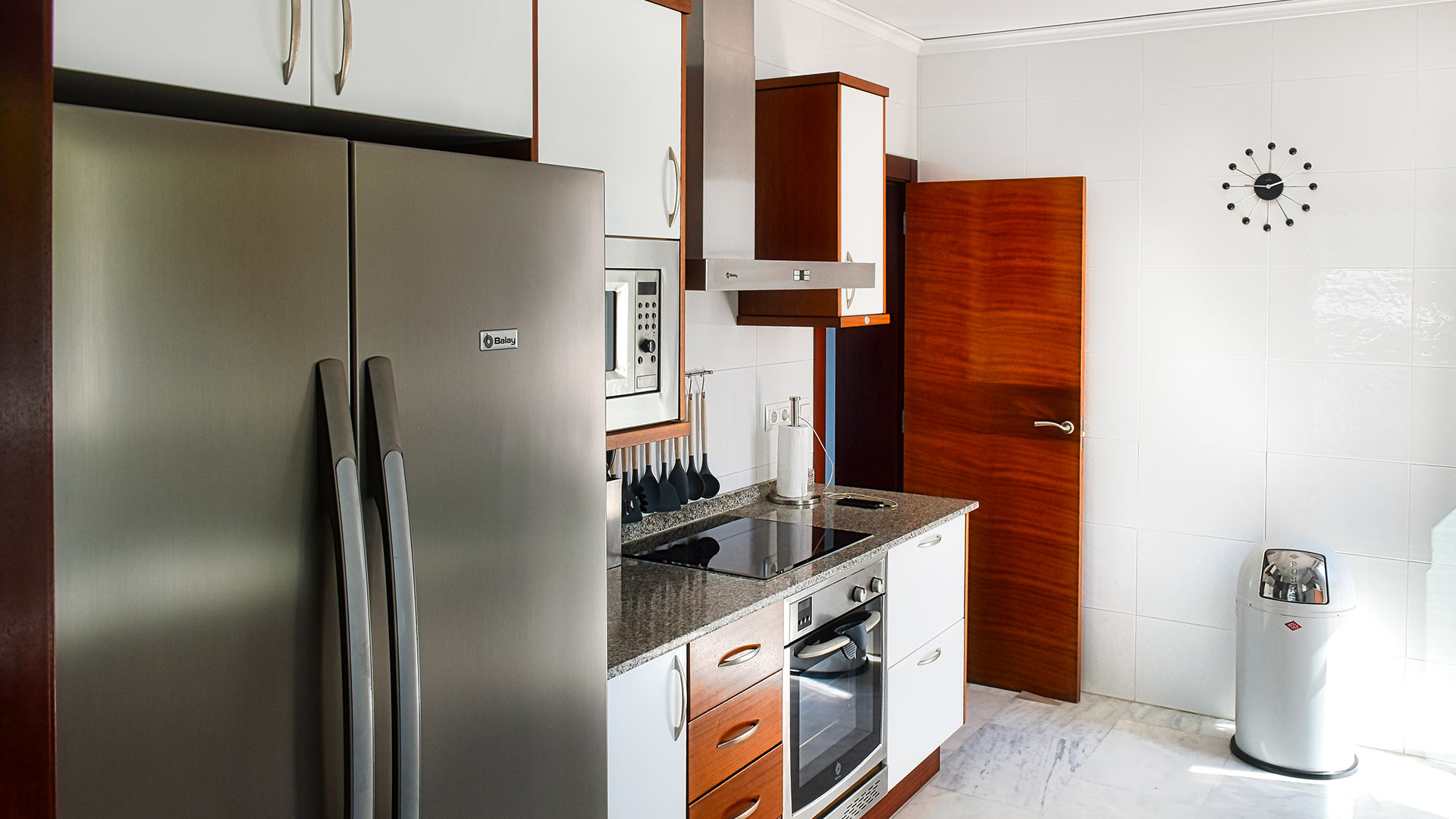 Kitchen with modern appliances at Villa White Beach in Ibiza