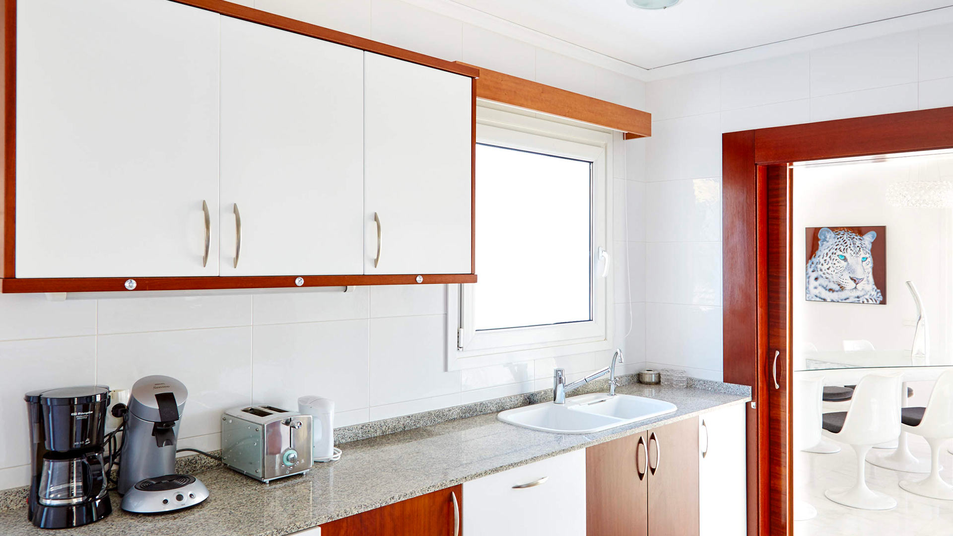 The light and comfortable kitchen at Villa White Beach in Ibiza