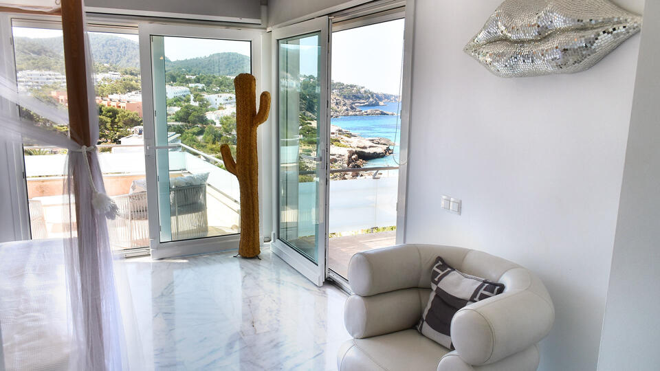 A bright and airy bedroom at Villa White Beach in Ibiza