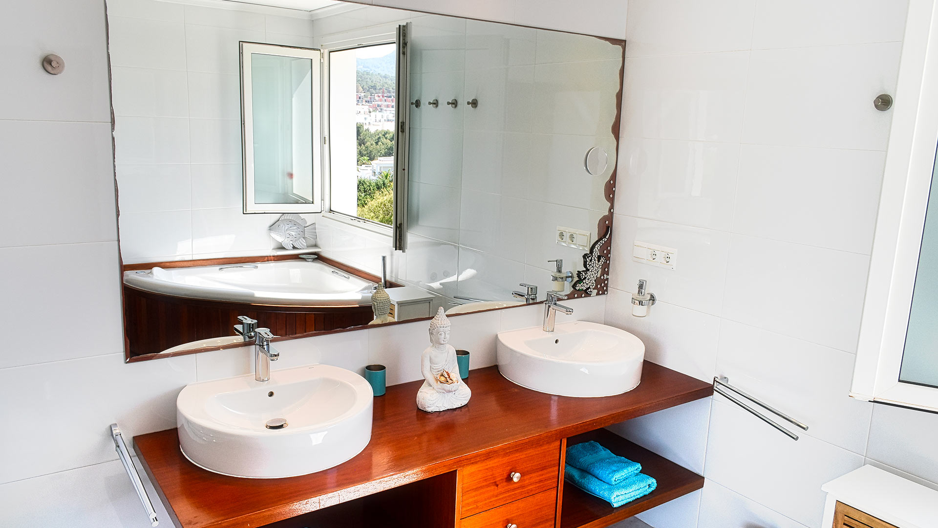 Large bathroom with his and her sinks at Villa White Beach in Ibiza