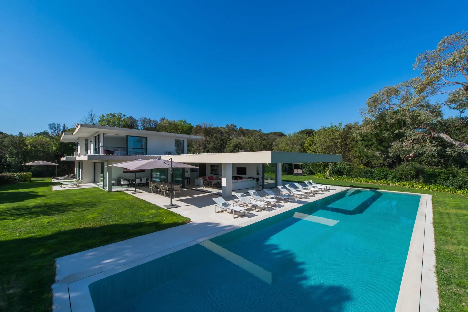 The large swimming pool behind Villa Kimberly in St Tropez