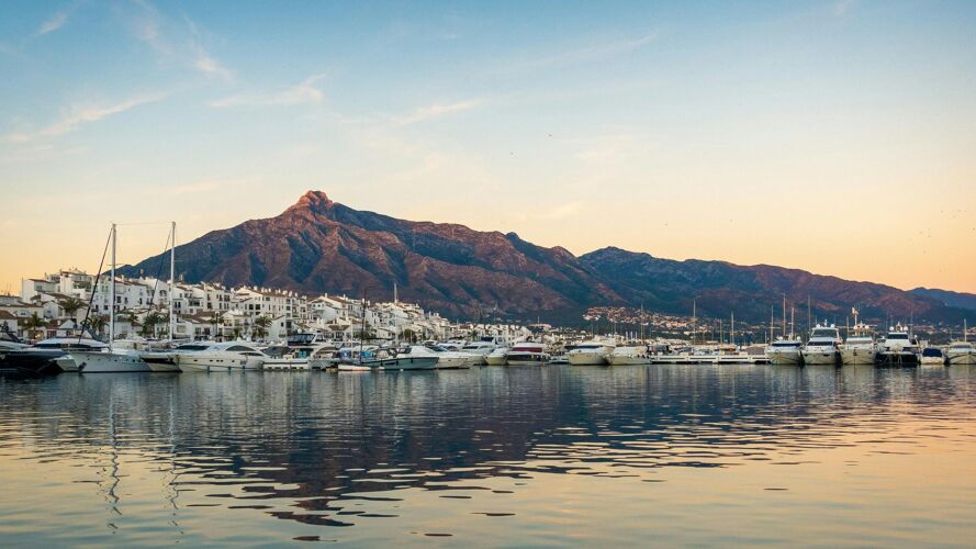 View of the harbour in Marbella with the Mountains in the background