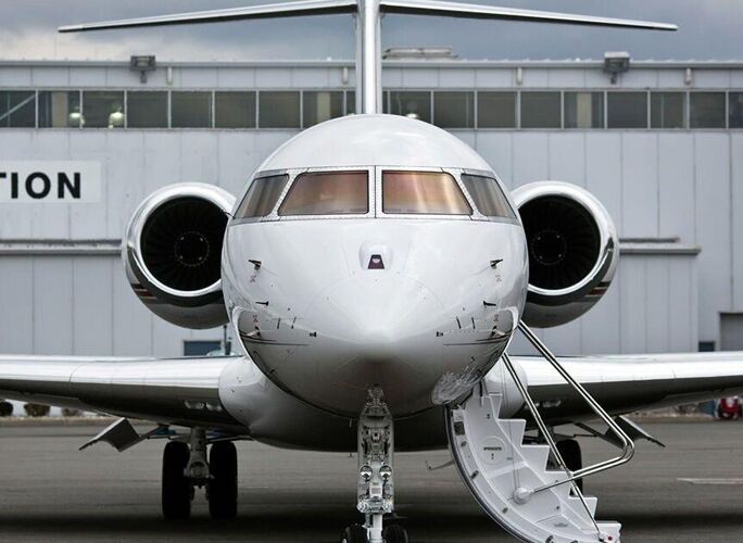 Private Jet Outside Hanger Ready to be Boarded