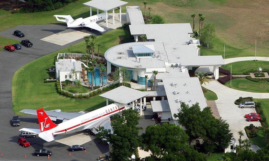 John Travolta's Florida home with private jet in the driveway