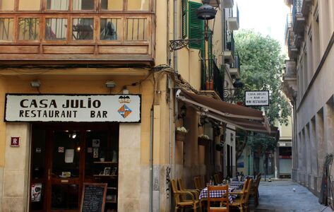 View of a restaurant and alleyway in Palma De Mallorca