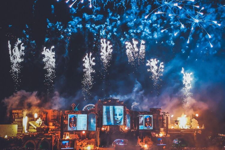 One of the stages at Tomorrowland with a large firework display above