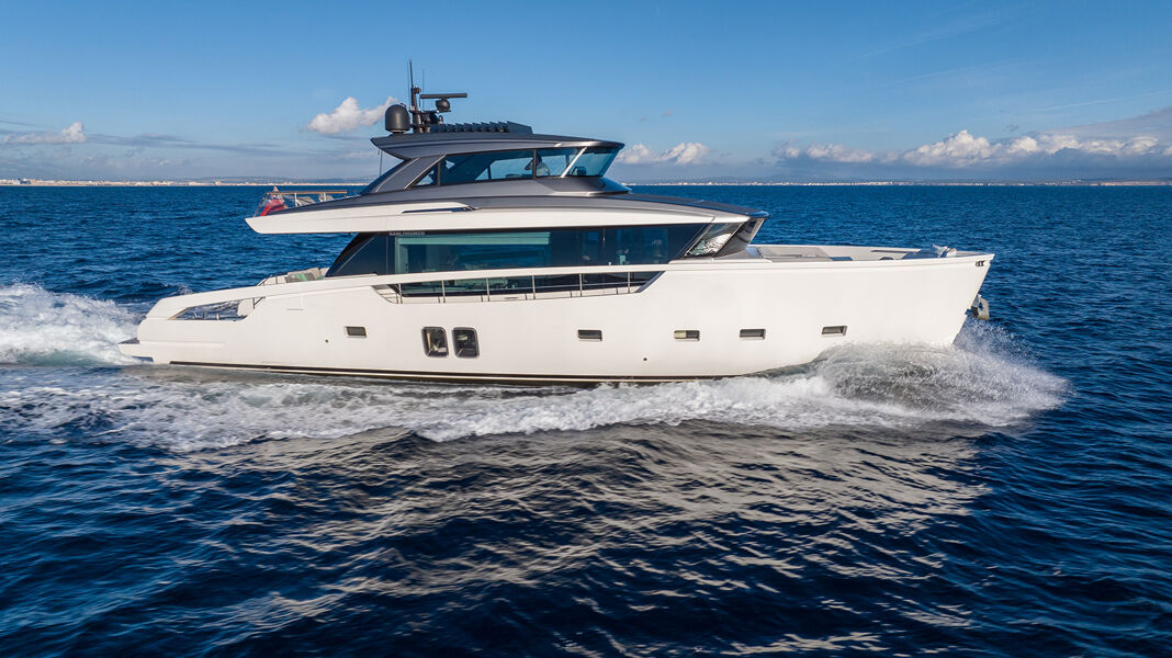 Starboard side of motor yacht Cloud IX sailing the sea