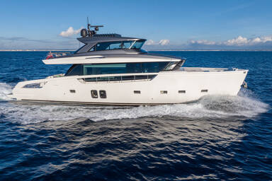 Starboard side of motor yacht Cloud IX sailing the sea