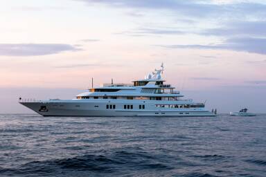 Port view of motor yacht Coral Ocean in the sea on charter with Bluemoon
