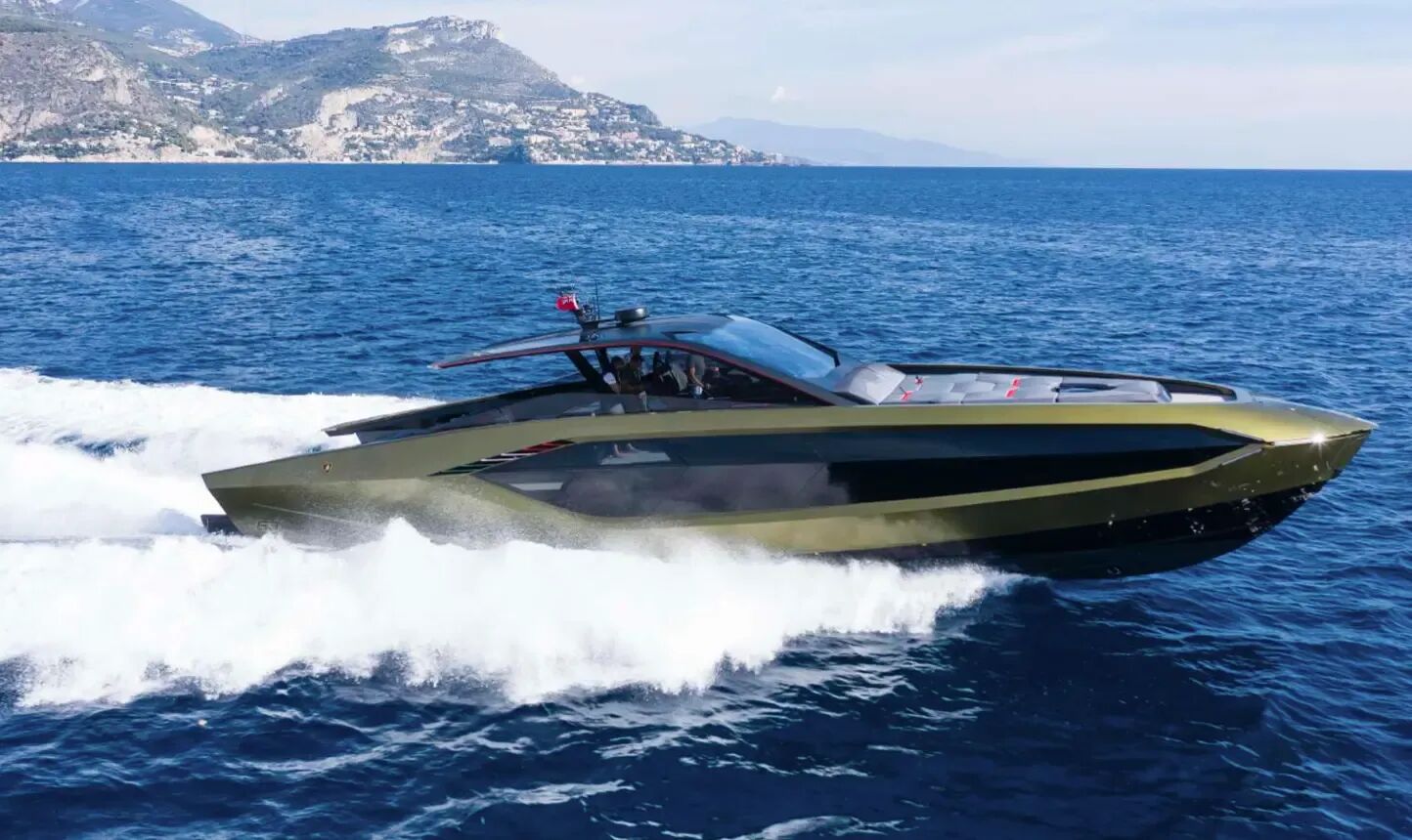 Starboard view of motor yacht Fast One speeding through the Med