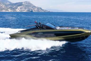 Starboard view of motor yacht Fast One speeding through the Med