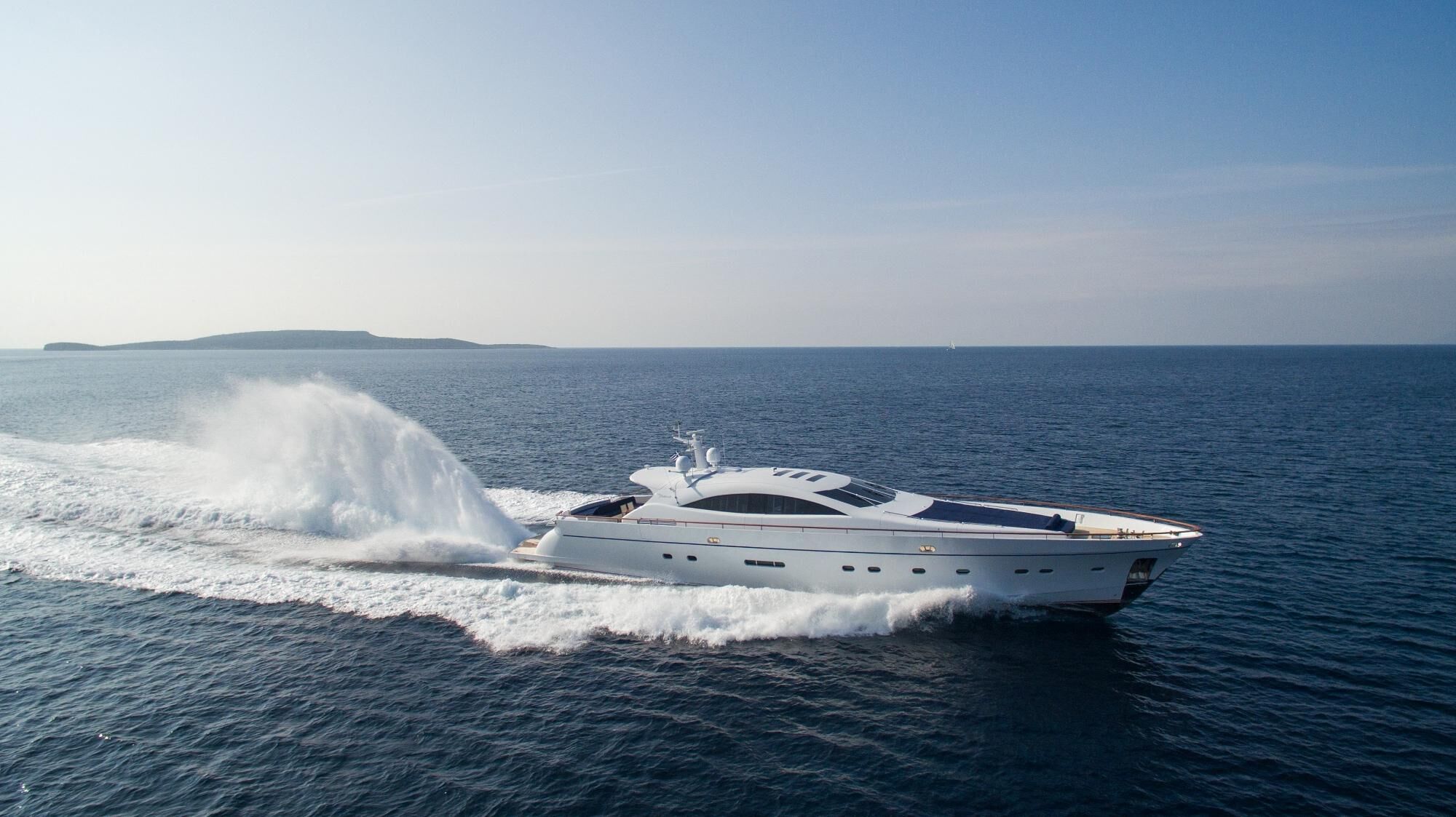 Kambos Blue, charter yacht available from Bluemoon, speeding through the waters.