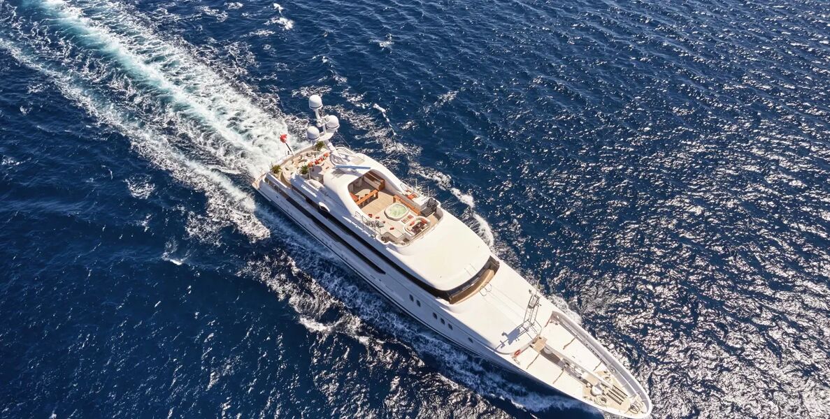 Aerial view of charter yacht Seahorse cruising in the sea for charter with Bluemoon