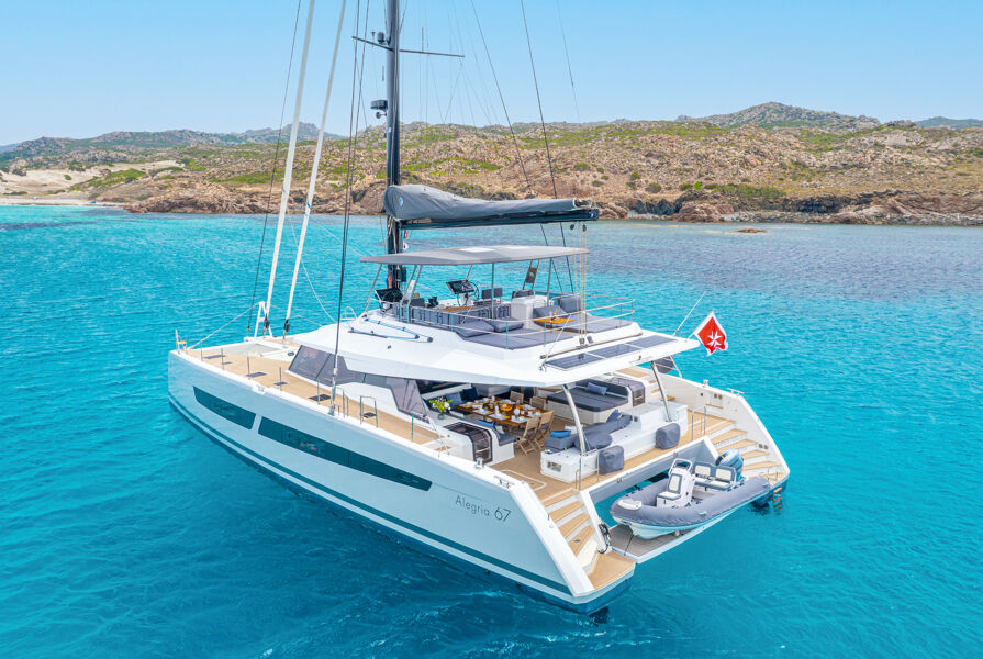 View of Semper Fidelis catamaran yacht at anchor In the beautiful Bahamas trade winds