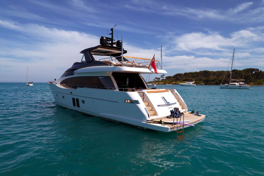 Charter yacht Triple L's aft deck at anchor with diving equipment on the swim platform